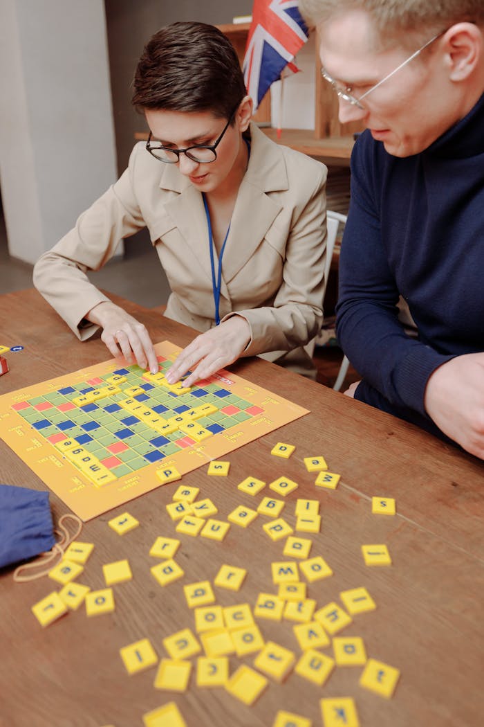 Two adults engaged in a word game, enhancing language skills and teamwork.